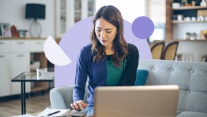 Image of woman using a laptop and a calculator